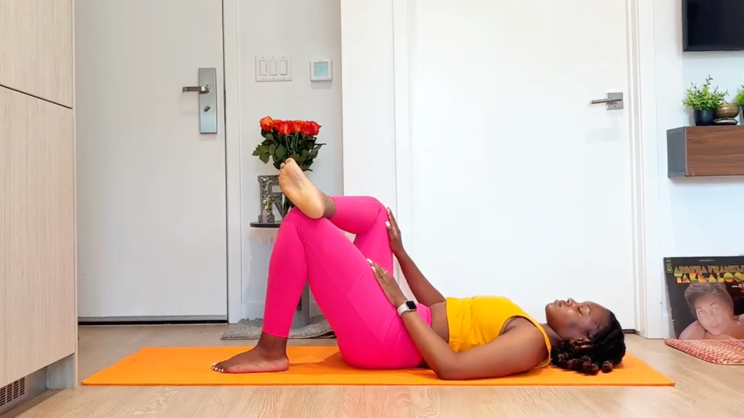 Yoga teacher practicing Figure 4